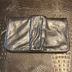 Beautiful silver Gianni Bini clutch.